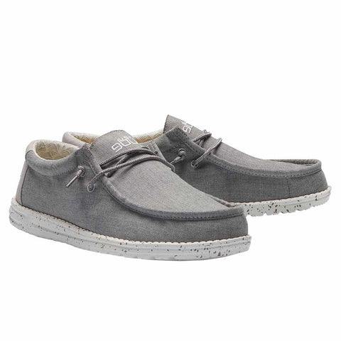 Hey Dude Wally Chambray slip-on shoes takes comfort to a whole new level.  Shop Bennett's Clothing for the brands you want and the customer service you deserve.  